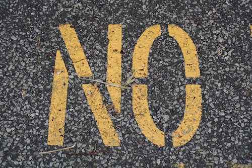 Spray painting of the word "No".