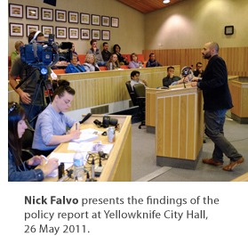 Nick Falvo presents the findings of the policy report at Yellowknife City Hall, 26 May 2011